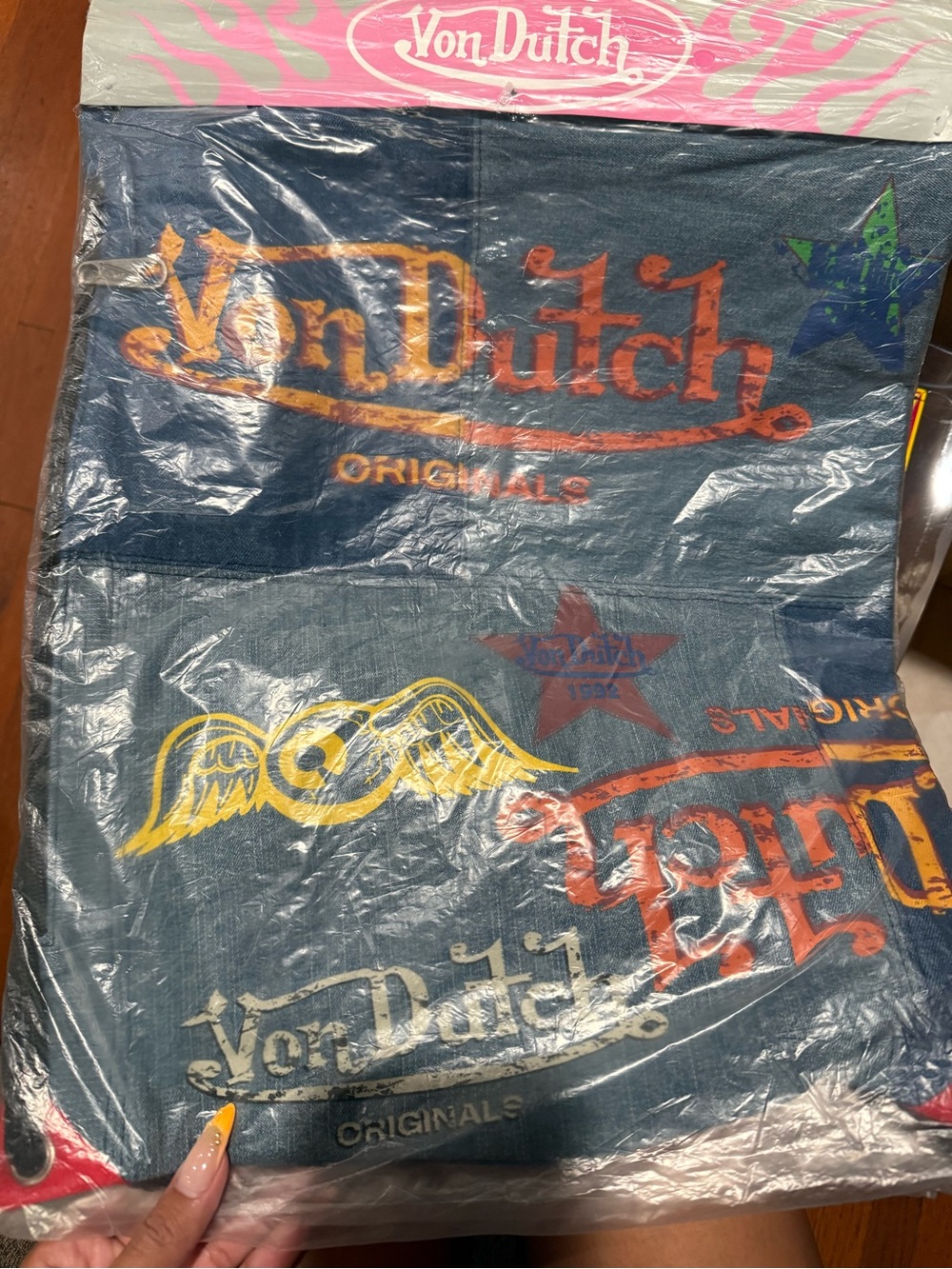 Von Dutch Graphic Logo Drawstring Bag in Navy with Multicolor Prints